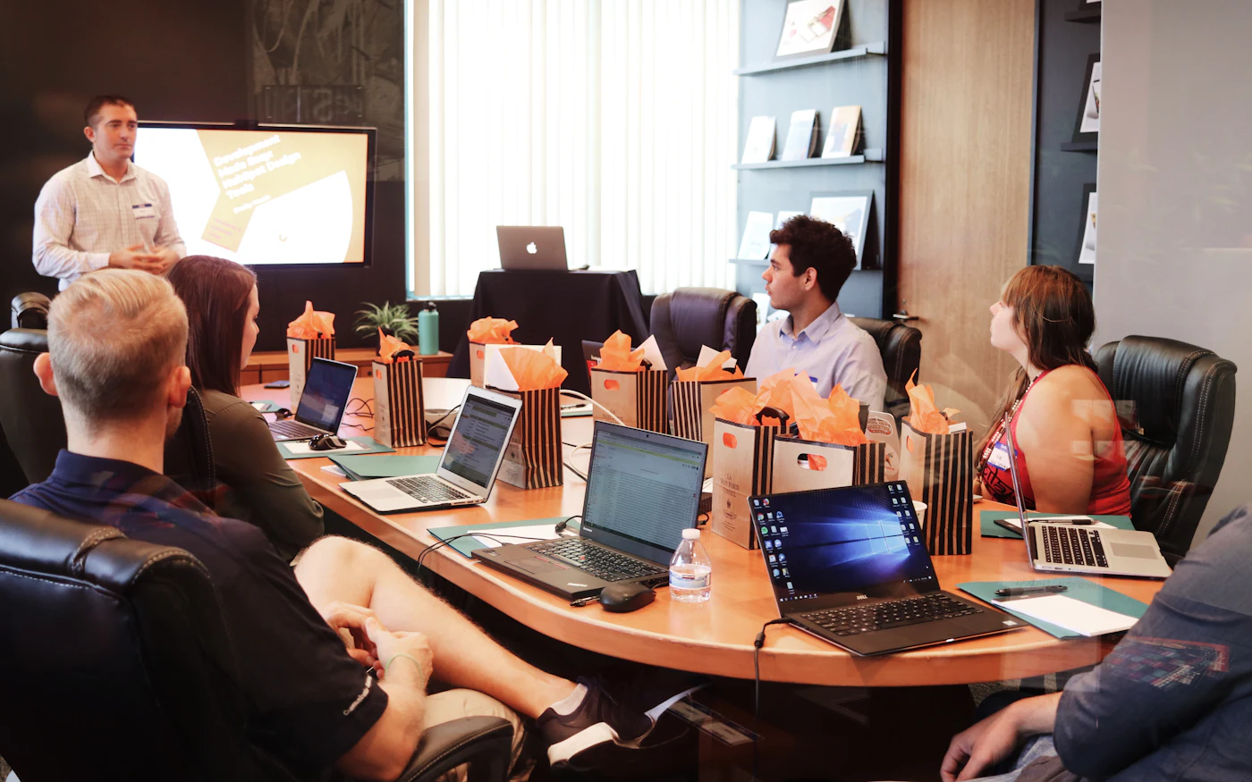 Consultant presenting to a client team